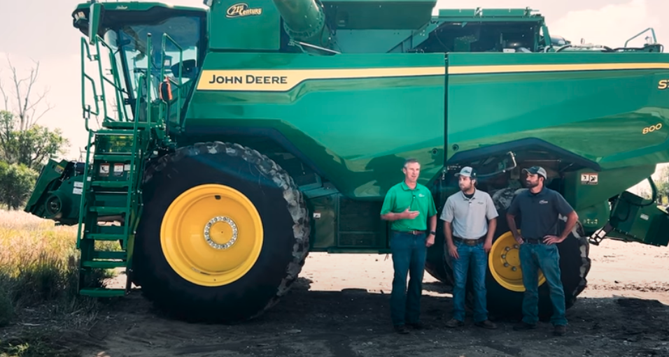 Mike Wernhoff, Hayden Fox, and Troy Randall standing beside the S7 800